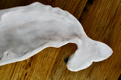 Hanging sperm whale sculpture by Laura Rotelli
