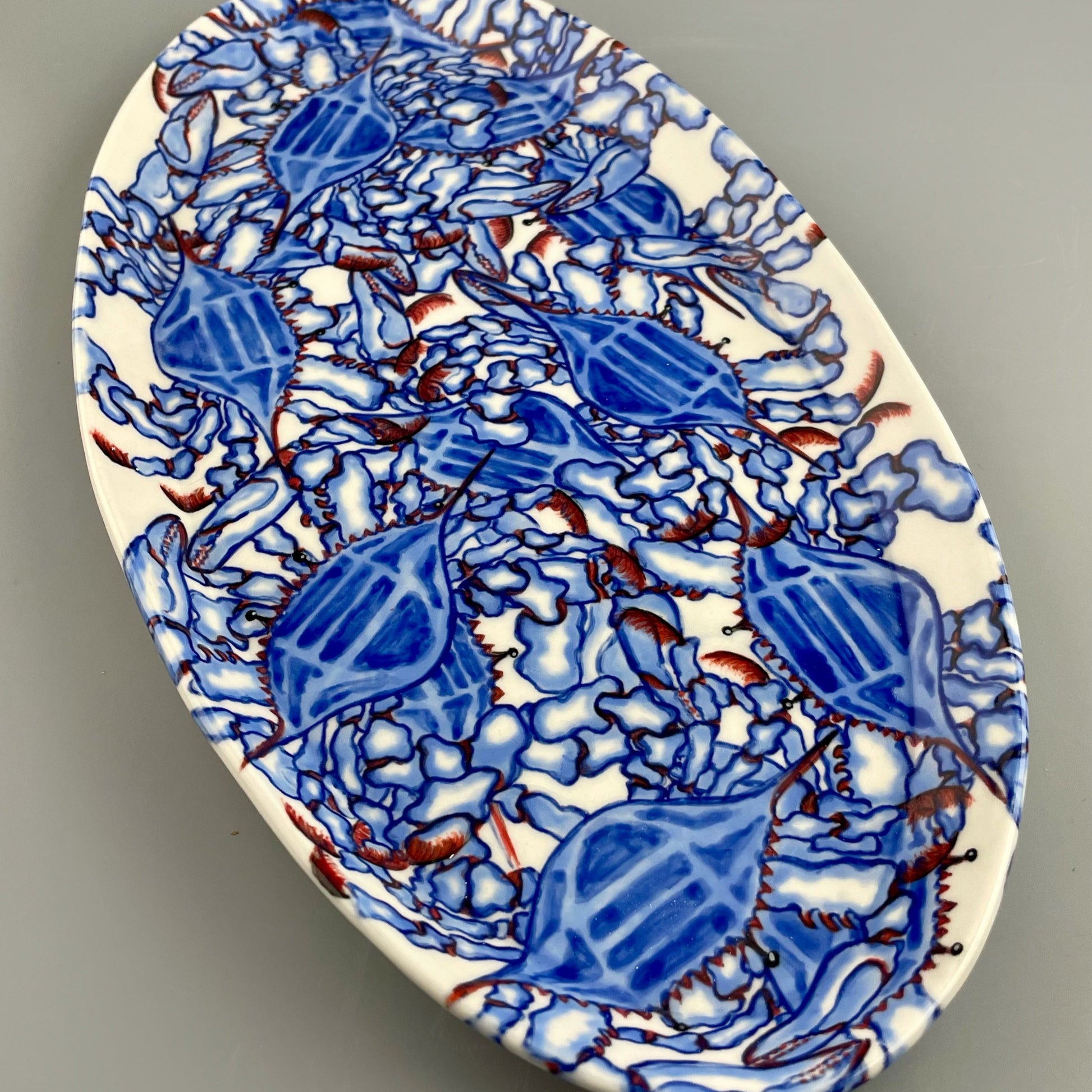 Hand-crafted porcelain platter with blue crab design