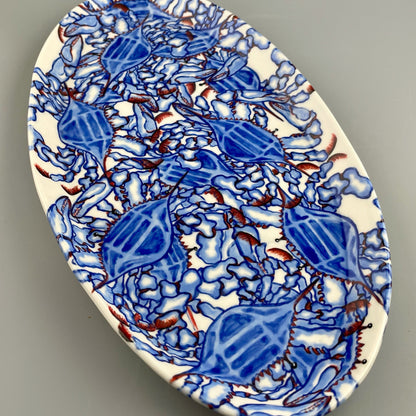 Hand-crafted porcelain platter with blue crab design