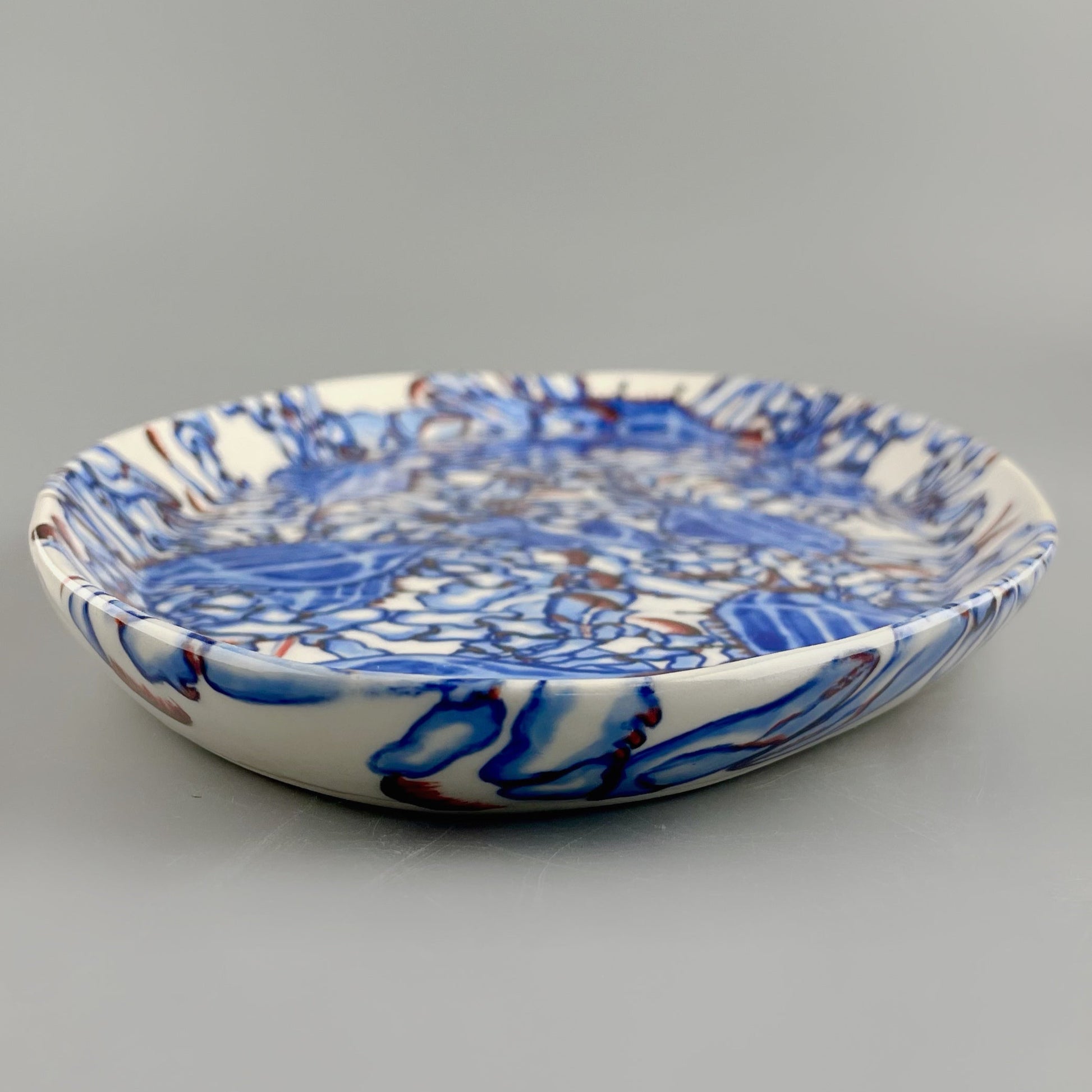 Hand-crafted porcelain platter with blue crab design