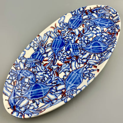 Hand-crafted porcelain platter with blue crab design