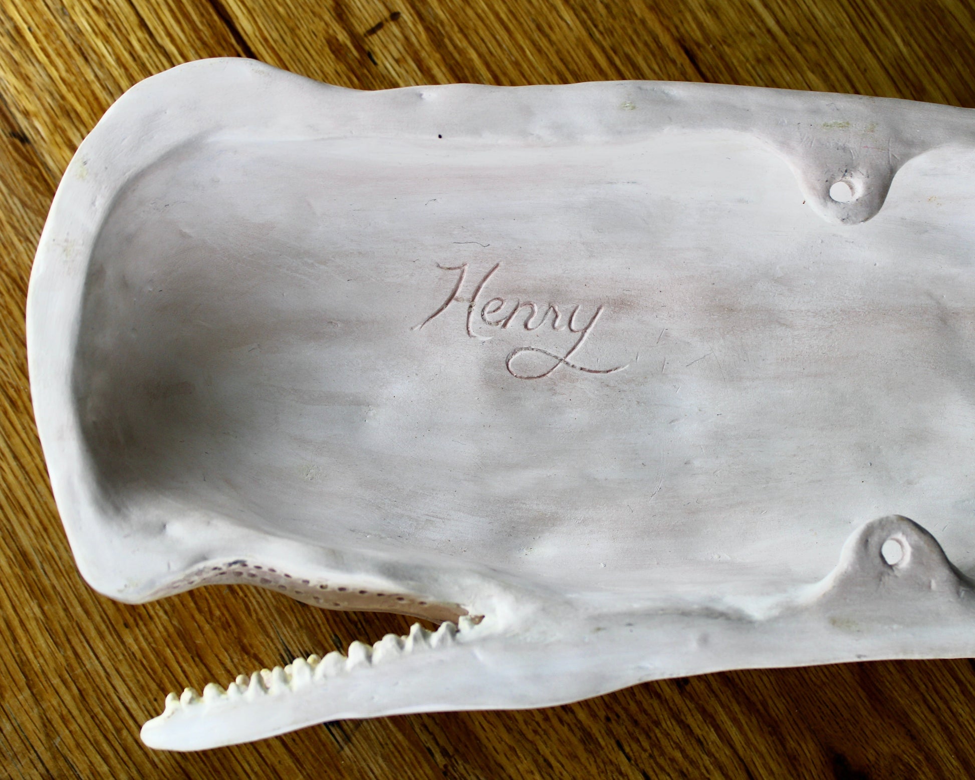 Hanging sperm whale sculpture by Laura Rotelli