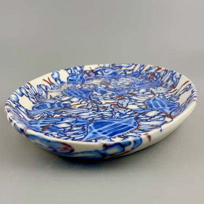 Hand-crafted porcelain platter with blue crab design