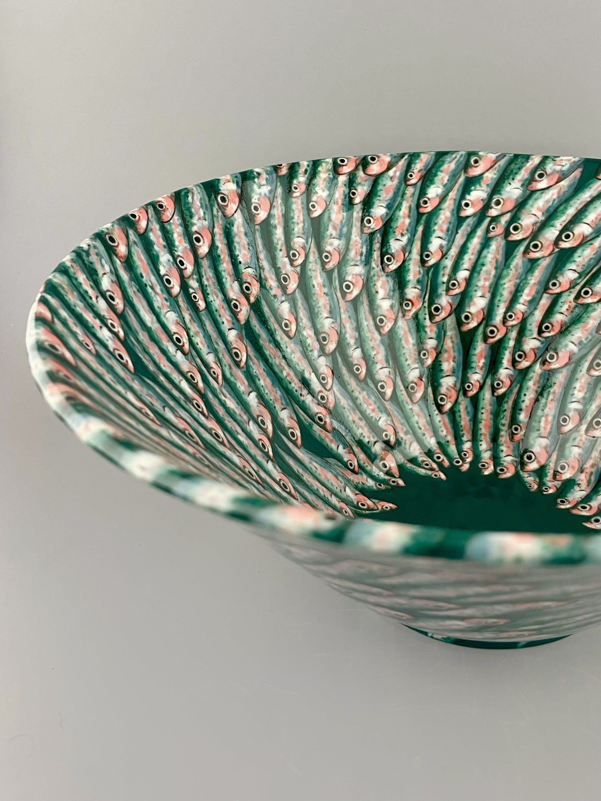 Hand-painted porcelain bowl with swimming sardines