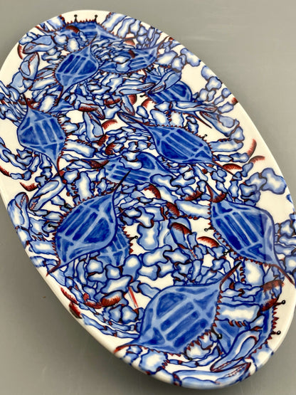 Hand-crafted porcelain platter with blue crab design