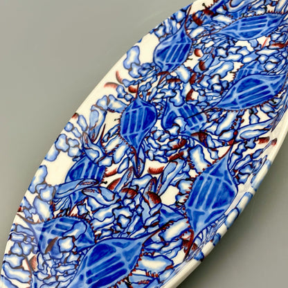 Hand-crafted porcelain platter with blue crab design