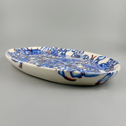 Hand-crafted porcelain platter with blue crab design