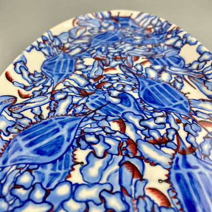 Hand-crafted porcelain platter with blue crab design