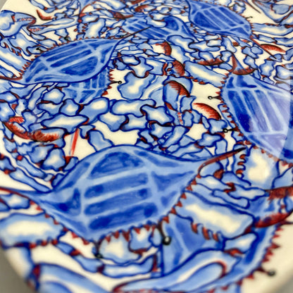 Hand-crafted porcelain platter with blue crab design