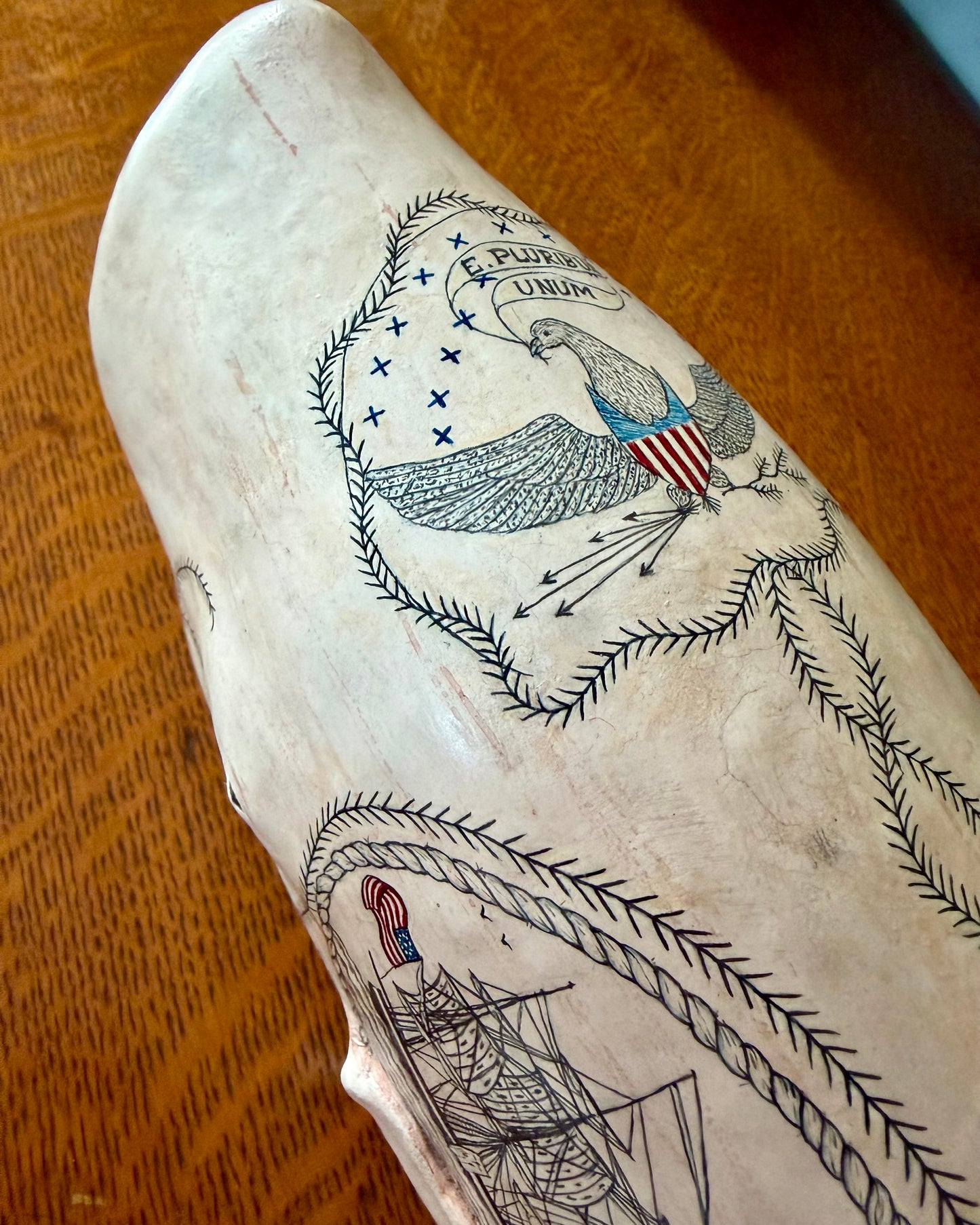 whale sculpture with scrimshaw designs.  Americana.  maritime art.  Nautical decor.  