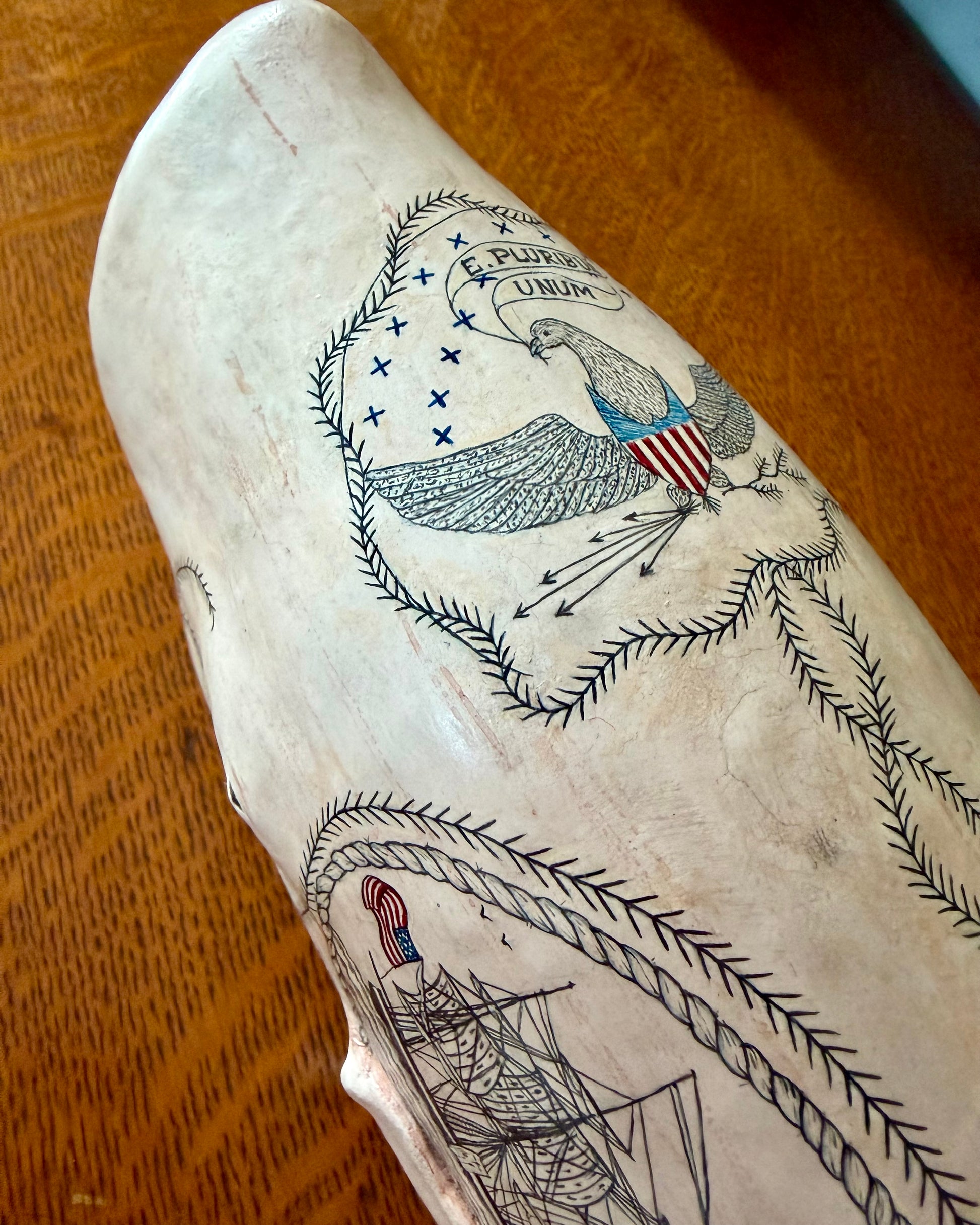 whale sculpture with scrimshaw designs.  Americana.  maritime art.  Nautical decor.  