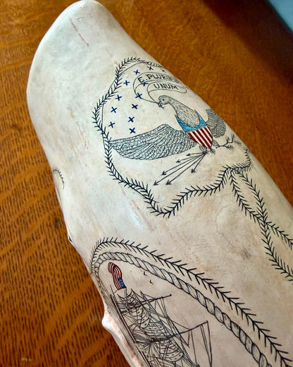 whale sculpture with scrimshaw designs.  Americana.  maritime art.  Nautical decor.  