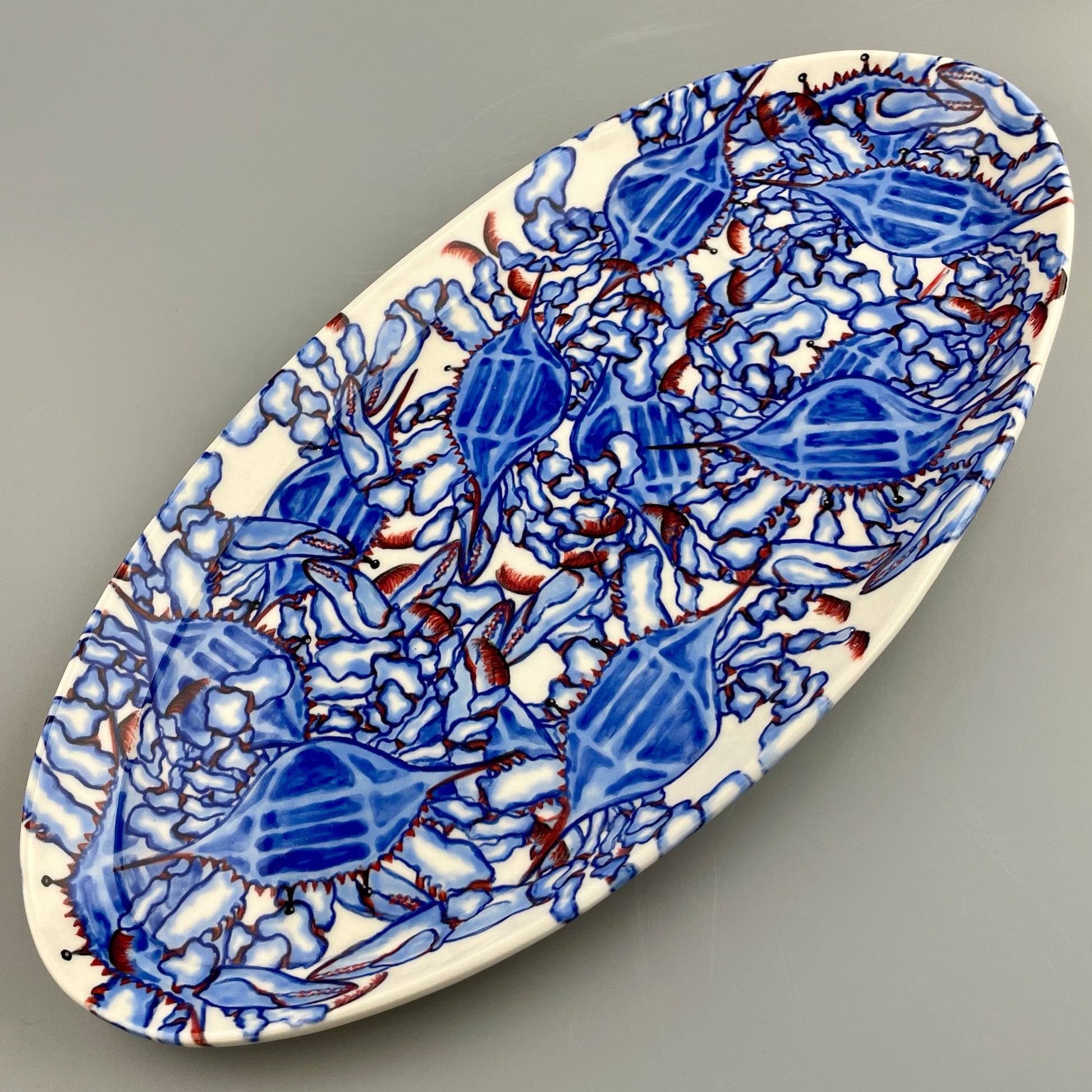 Hand-crafted porcelain platter with blue crab design