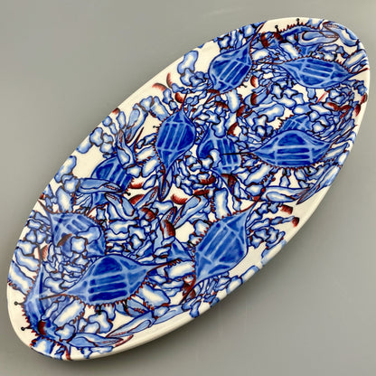 Hand-crafted porcelain platter with blue crab design