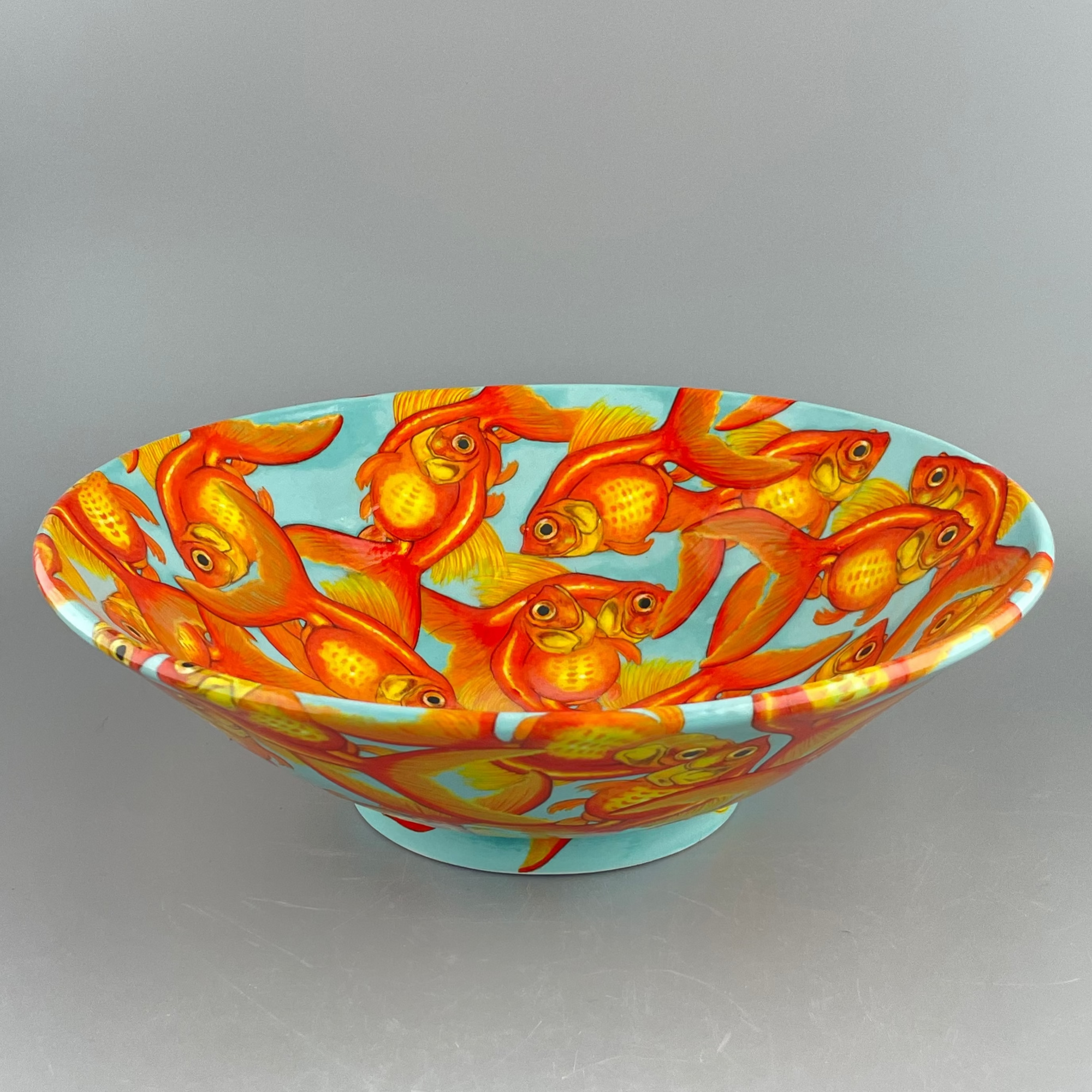 Porcelain bowl with hand-painted goldfish design