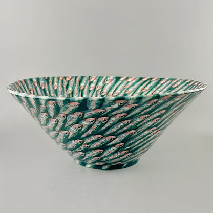Hand crafted porcelain bowl with swimming sardines