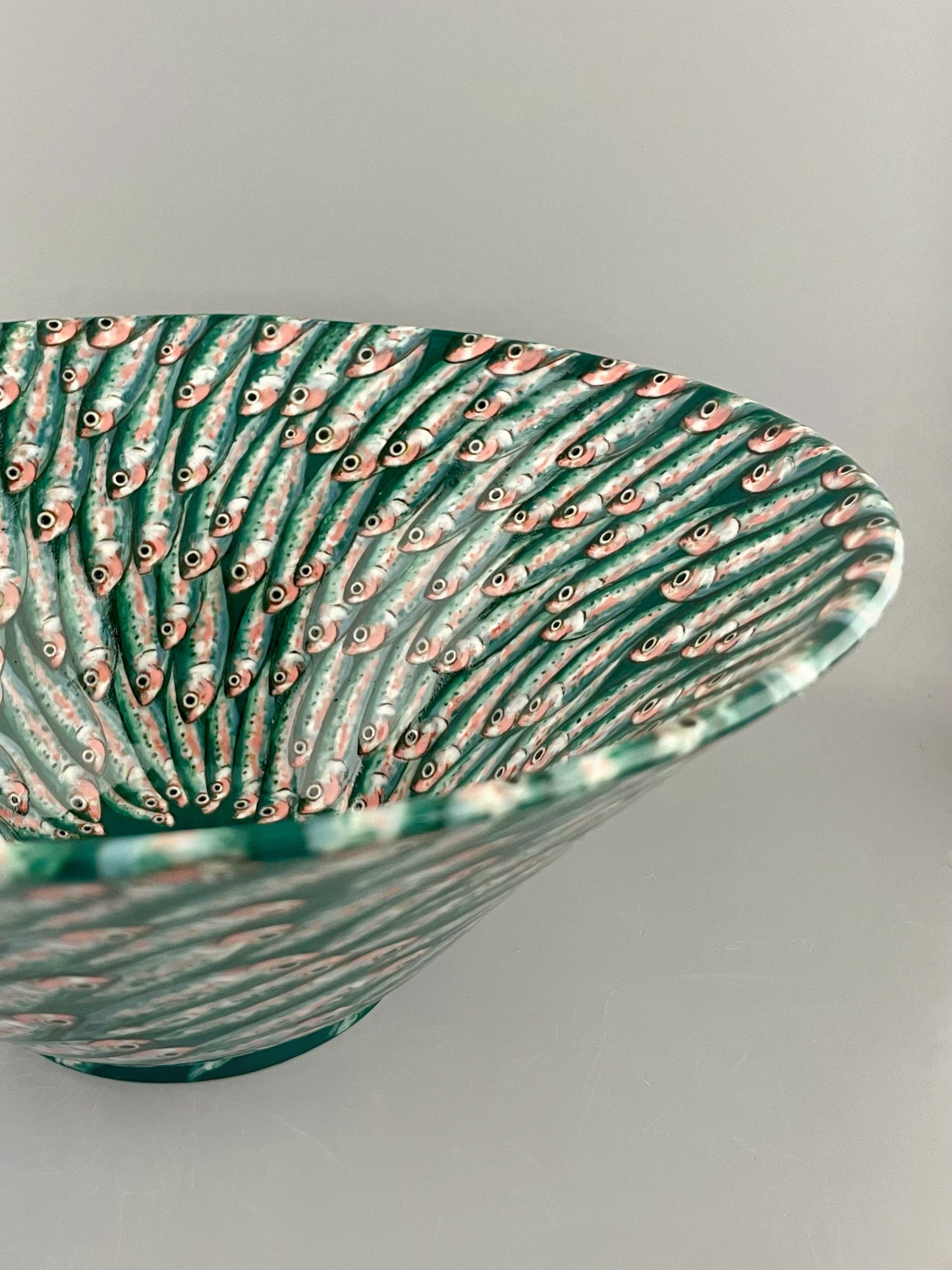 Hand-painted porcelain bowl with swimming sardines