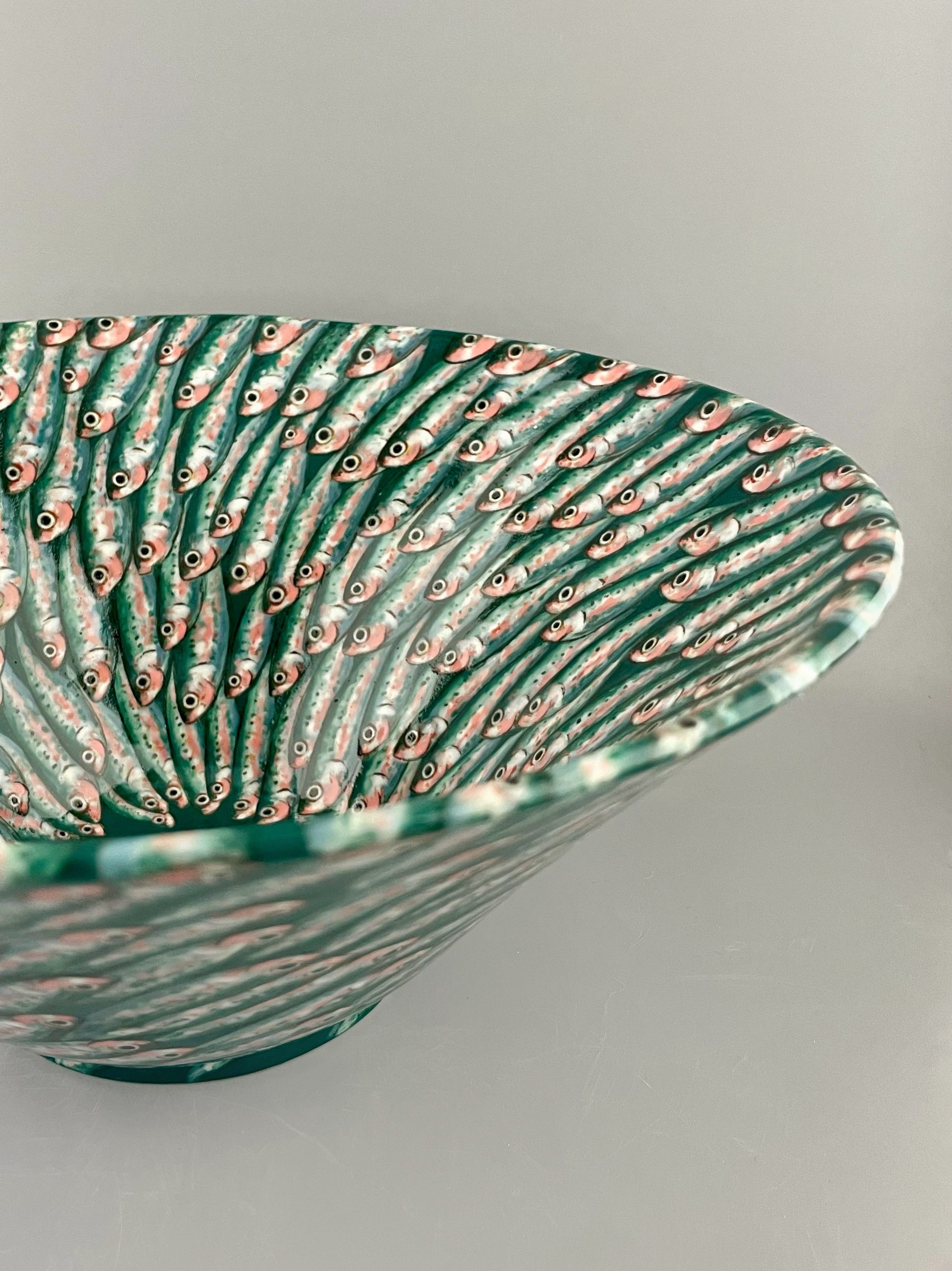 Hand-painted porcelain bowl with swimming sardines