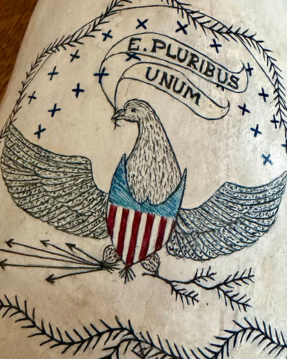 Sperm whale sculpture with scrimshaw design.  American maritime art.